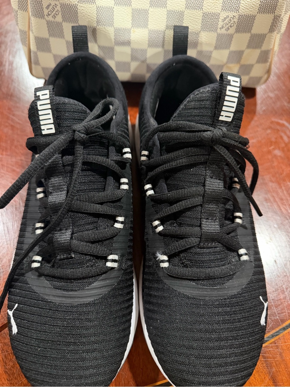 Puma Women's Black Knit Sneakers with White Accents